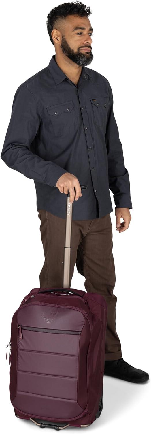 imageOsprey Ozone 2Wheel CarryOn Lightweight CarryOn Luggage with Oversized Wheels and Trolley Handle Rolling Travel Suitcase for Air Travel Overhead Compartments and Weekend Trips Moody BurgundyBlack