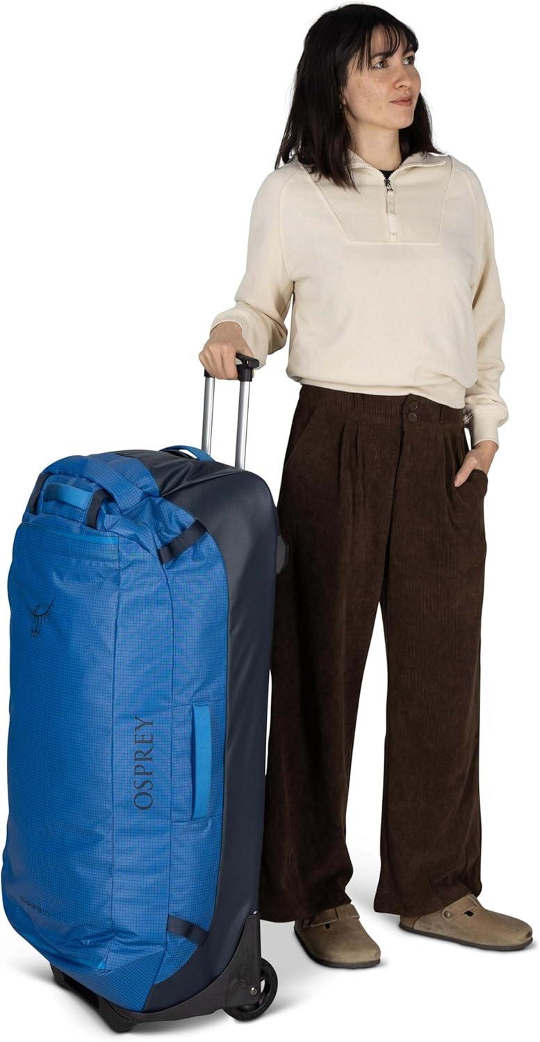 imageOsprey Transporter 90L Wheeled Travel Duffel Bag Large Lightweight Rolling Suitcase for Men and Women Blue FlameNocturnal BlueRaven Black