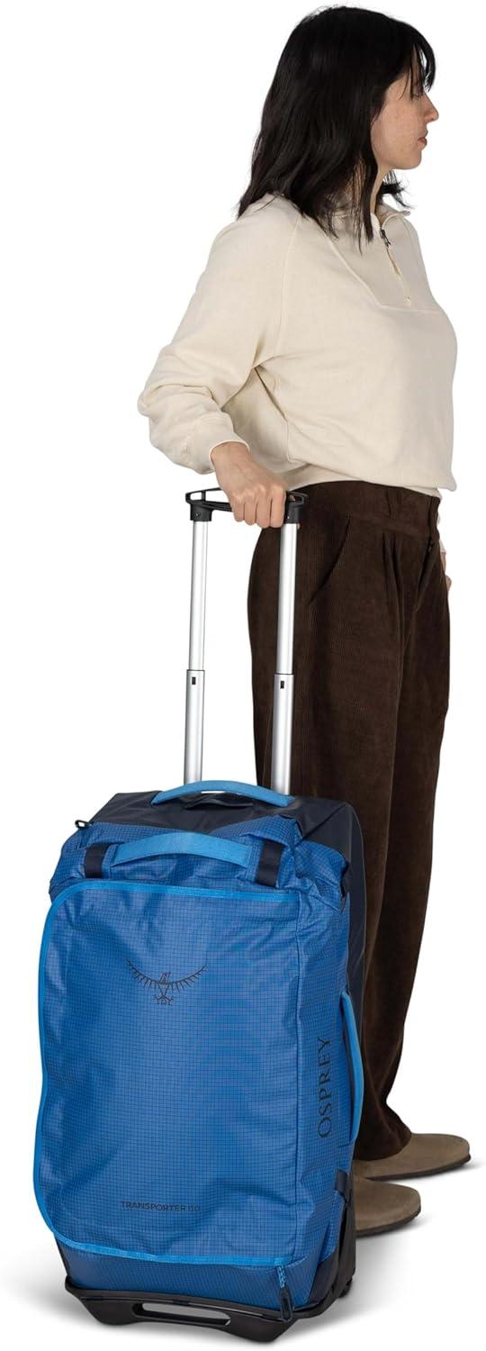 imageOsprey Transporter 90L Wheeled Travel Duffel Bag Large Lightweight Rolling Suitcase for Men and Women Blue FlameNocturnal BlueRaven Black