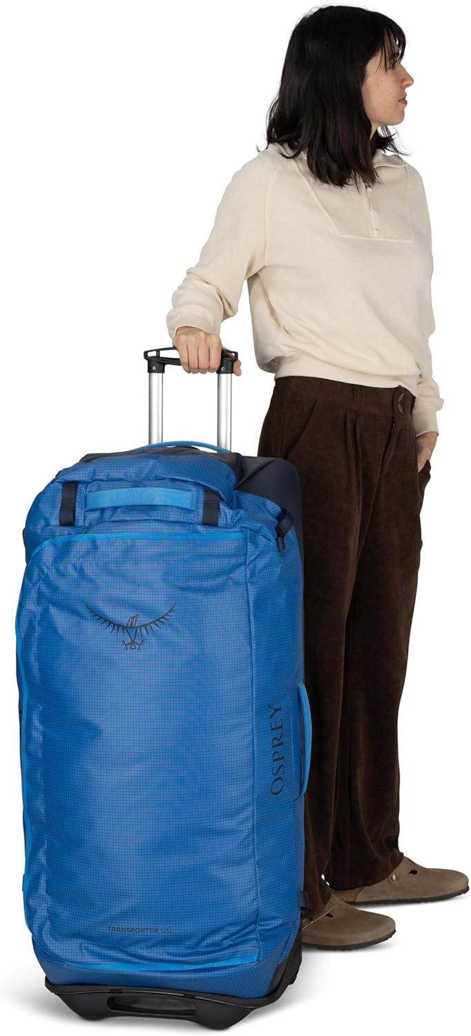 imageOsprey Transporter 90L Wheeled Travel Duffel Bag Large Lightweight Rolling Suitcase for Men and Women Blue FlameNocturnal BlueRaven Black